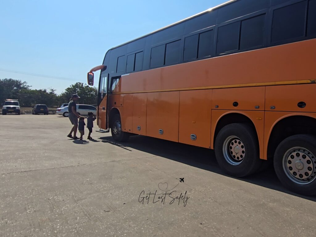 Boarding the bus at Lunga Lunga one stop border post. Land crossing from Kenya to Tanzania by public transportation.